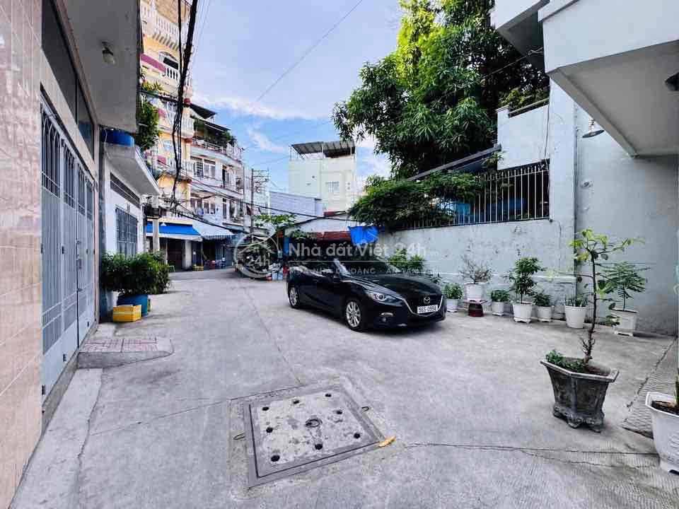 SÁT MẶT TIỀN-XE HƠI QUAY ĐẦU SÁT CỬA - 42M2 - 4 TẦNG BTCT- LÊ QUANG Đ